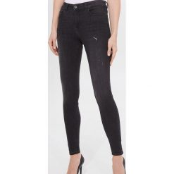 Jeansy skinny Eco Aware - Czarny. Czarne jeansy damskie Mohito. Za 139,99 zł.