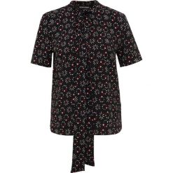 Emporio Armani Bluzka nero. Czarne bluzki damskie Emporio Armani, bez wzorów, z elastanu, bez kołnierzyka, bez rękawów. Za 609,00 zł.