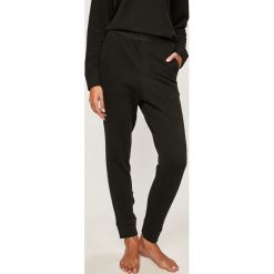 Calvin Klein Underwear - Spodnie piżamowe. Pomarańczowe piżamy damskie Calvin Klein Underwear, s, z elastanu. Za 269,90 zł.