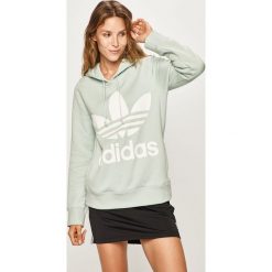 Adidas Originals - Bluza. Zielone bluzy damskie adidas Originals, z nadrukiem, z elastanu, bez rękawów, z kapturem. W wyprzedaży za 219,90 zł.