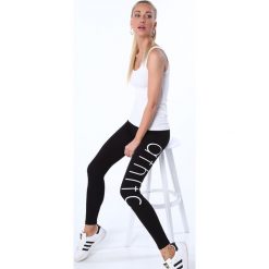 Legginsy z napisem czarne 7903. Czarne legginsy we wzory marki Fasardi, s. Za 29,00 zł.