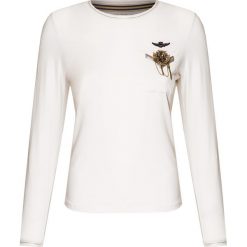 T-shirt z długim rękawem AERONAUTICA MILITARE. Białe bluzki damskie Aeronautica Militare, z aplikacjami, z bawełny, bez kołnierzyka. Za 550,00 zł.