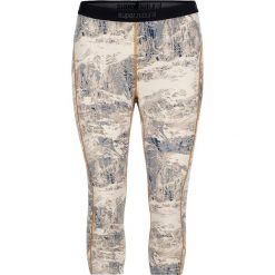 Sportowe legginsy w kolorze kremowo-szarym. Białe legginsy sportowe damskie marki super.natural, s. W wyprzedaży za 130,95 zł.