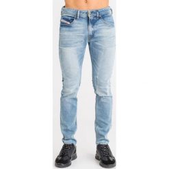 JEANSY SLIM FIT DIESEL. Żółte jeansy męskie Diesel, m, z aplikacjami. Za 869,40 zł.