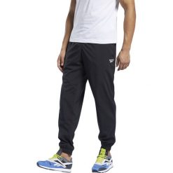 MĘSKIE SPODNIE DRESOWE REEBOK (M). Spodnie męskie Reebok, m, z dresówki. Za 159,99 zł.
