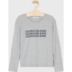 Calvin Klein Jeans - Longsleeve dziecięcy 128-176 cm. Szare bluzki dziewczęce Calvin Klein Jeans, z nadrukiem, z bawełny, z okrągłym kołnierzem, z długim rękawem, długie, bez kaptura. Za 129,90 zł.