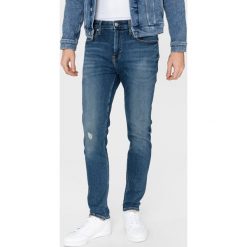 Calvin Klein 016 Dżinsy Niebieski. Niebieskie jeansy męskie Calvin Klein, bez wzorów. Za 497,95 zł.