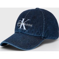 Calvin Klein Jeans - Czapka. Niebieskie czapki damskie Calvin Klein Jeans, bez wzorów, z bawełny. W wyprzedaży za 99,90 zł.
