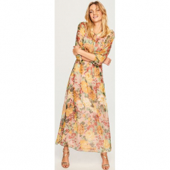 Sukienka maxi w kwiaty - Kremowy. Białe długie sukienki marki Reserved, w kwiaty. Za 199,99 zł.