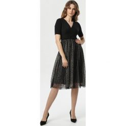 Czarna Sukienka Eliot. Czarne sukienki damskie Born2be, s, w kropki, z dzianiny, eleganckie, krótkie, midi, rozkloszowane. Za 129,99 zł.