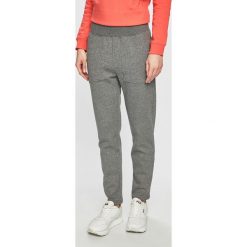 Under Armour - Spodnie. Szare spodnie damskie Under Armour, s, bez wzorów, z bawełny. W wyprzedaży za 149,90 zł.