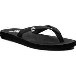 Japonki adidas - Eezay Essence W CP9873 Cblack/Cblack/Ftwwht. Czarne klapki damskie Adidas, w paski, z tworzywa sztucznego, bez obcasa. Za 89,00 zł.