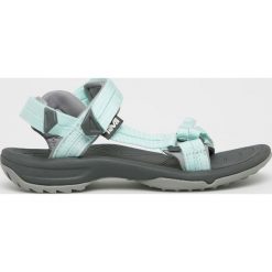 Teva - Sandały. Zielone klapki damskie Teva, bez wzorów, z materiału, bez obcasa, na obcasie. W wyprzedaży za 219,90 zł.