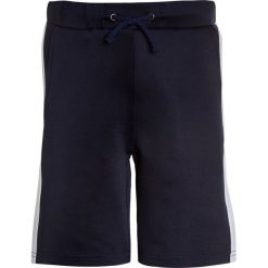 The New GAVIN Spodnie treningowe black iris/bright white. Niebieskie jeansy chłopięce marki The New. Za 159,00 zł.