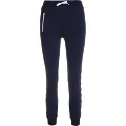 Hummel PANTS Spodnie treningowe total eclipse. Niebieskie spodnie chłopięce marki Hummel, z bawełny. Za 169,00 zł.