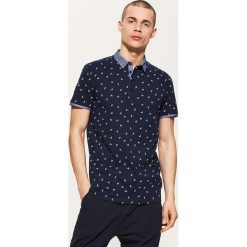 Koszulka polo z kontrastowym kołnierzykiem - Granatowy. Niebieskie koszulki męskie House, s, bez wzorów, bez rękawów. Za 59,99 zł.