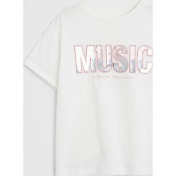 Mango Kids - T-shirt dziecięcy Bling 110-164 cm. Białe bluzki dziewczęce Mango Kids, z aplikacjami, z bawełny, z okrągłym kołnierzem, z krótkim rękawem, krótkie, bez kaptura. Za 49,99 zł.