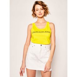 Top Calvin Klein Jeans J20J213051. Żółte bluzki damskie Calvin Klein Jeans, s, bez wzorów, z bawełny, polo. W wyprzedaży za 99,00 zł.