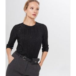 Błyszcząca bluzka - Czarny. Czarne bluzki damskie Mohito, s. Za 89,99 zł.