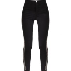 Topshop FISHNET JONI Jeans Skinny Fit black. Czarne rurki damskie marki Topshop. W wyprzedaży za 149,40 zł.
