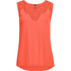Top z koronką bonprix łososiowy. Pomarańczowe topy damskie bonprix, w koronkowe wzory, z koronki, z okrągłym kołnierzem. Za 27,99 zł.