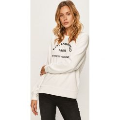 Karl Lagerfeld - Bluza. Białe bluzy damskie KARL LAGERFELD, s, z nadrukiem, z bawełny, bez rękawów, bez kaptura. W wyprzedaży za 539,90 zł.