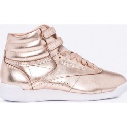 Reebok Classic - Buty. Żółte buty sportowe damskie Reebok Classic, bez wzorów, ze skóry, sportowe, reebok classic. W wyprzedaży za 129,90 zł.