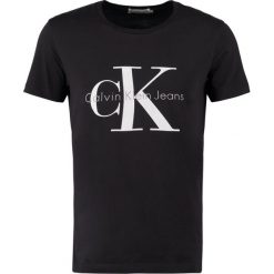 Calvin Klein Jeans Tshirt z nadrukiem meteorite. Czarne koszulki polo męskie Calvin Klein Jeans, m, z nadrukiem, z bawełny. W wyprzedaży za 164,25 zł.
