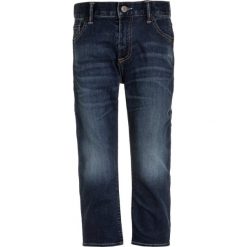 GAP Jeansy Slim Fit medium wash. Niebieskie jeansy dziewczęce marki GAP. Za 149,00 zł.