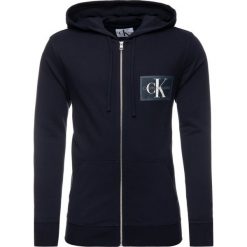 Bluza Calvin Klein Jeans J30J312584. Niebieskie bluzy męskie Calvin Klein Jeans, xl, bez wzorów, z bawełny, bez kołnierzyka, bez rękawów, bez kaptura. W wyprzedaży za 329,00 zł.