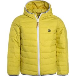 Timberland Kurtka przejściowa anis. Żółte kurtki męskie marki Timberland, z materiału. W wyprzedaży za 341,10 zł.