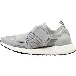 Adidas by Stella McCartney ULTRA BOOST X Obuwie do biegania treningowe stone/midgreen/black. Czarne buty damskie do biegania marki adidas by Stella McCartney, z tworzywa sztucznego. Za 899,00 zł.
