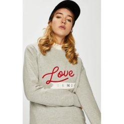 Femi Stories - Bluza Ella. Białe bluzy damskie Femi Stories, s, z nadrukiem, z elastanu, bez rękawów, bez kaptura. W wyprzedaży za 159,90 zł.
