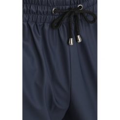 Rains Spodnie treningowe blue. Niebieskie spodnie dresowe damskie Rains, z poliesteru. Za 299,00 zł.