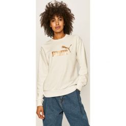 Puma - Bluza. Białe bluzy damskie Puma, s, z nadrukiem, z elastanu, bez rękawów, bez kaptura. W wyprzedaży za 159,90 zł.