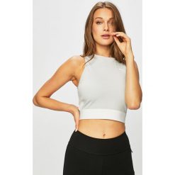 Puma - Top x SG. Szare bluzki damskie Puma, s, bez wzorów, z elastanu, z okrągłym kołnierzem. W wyprzedaży za 189,90 zł.