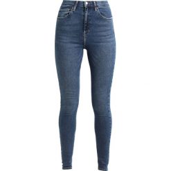 Topshop Tall JAMIE Jeans Skinny Fit mid denim. Niebieskie rurki damskie marki Topshop Tall. Za 229,00 zł.