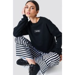 NA-KD Bluza oversize z nadrukiem - Black. Czarne bluzy z nadrukiem damskie marki NA-KD, z dzianiny. Za 161,95 zł.