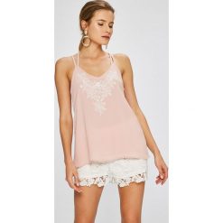 Answear - Top Stripes Vibes. Różowe topy damskie marki ANSWEAR, s, z nadrukiem, z poliesteru. W wyprzedaży za 59,90 zł.