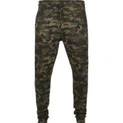 Spodnie dresowe męskie: Urban Classics Interlock Camo Pants Spodnie dresowe kamuflaż Woodland