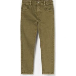 Spodnie z elastycznego materiału - Khaki. Brązowe spodnie męskie Reserved, bez wzorów. Za 69,99 zł.