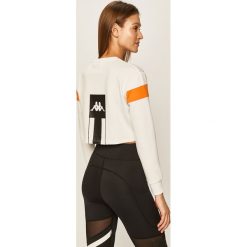 Kappa - Bluza. Białe bluzy damskie Kappa, s, z aplikacjami, z elastanu, bez rękawów, bez kaptura. W wyprzedaży za 159,90 zł.