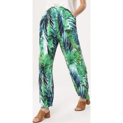 Biało-Zielone Spodnie Tropical Forest. Zielone spodnie damskie Born2be, s, z tkaniny. Za 69,99 zł.