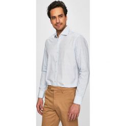 Pierre Cardin - Koszula. Niebieskie koszule męskie Pierre Cardin, bez wzorów, z bawełny, casualowe, z włoskim kołnierzykiem, z długim rękawem. W wyprzedaży za 159,90 zł.