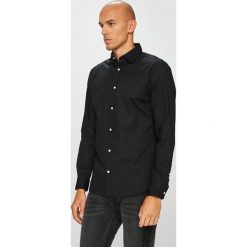 Jack & Jones - Koszula. Czarne koszule męskie na spinki Jack & Jones, l, z bawełny, z klasycznym kołnierzykiem, z długim rękawem. W wyprzedaży za 89,90 zł.