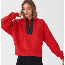 Bluza oversize z kapturem - Czerwony. Czerwone bluzy damskie House, s, bez wzorów, bez rękawów, z kapturem. Za 99,99 zł.