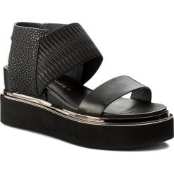 Sandały UNITED NUDE - Rico Sandal 103040188108 Black. Czarne klapki damskie marki United Nude, bez wzorów, ze skóry, bez obcasa, na obcasie. Za 799,00 zł.