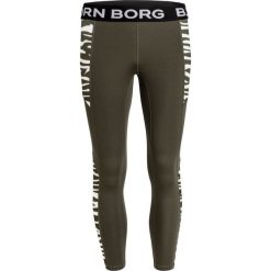 Björn Borg Tights Cherry 1P Forest Night 36. Czerwone spodnie damskie Björn Borg, bez wzorów, na fitness i siłownię. Za 225,00 zł.