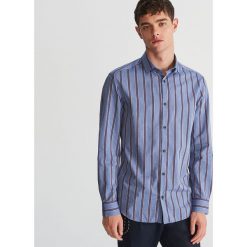 Koszula regular fit z lyocellem - Niebieski. Niebieskie koszule męskie Reserved, s, bez wzorów, z lyocellu, bez kołnierzyka, bez rękawów. W wyprzedaży za 59,99 zł.