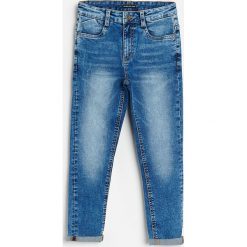 Jeansy carrot fit z efektem sprania - Niebieski. Niebieskie jeansy męskie Reserved, bez wzorów. Za 79,99 zł.
